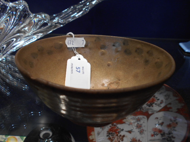 An early Oriental footed bowl with hand-painted floral design