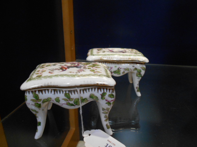 A pair of Austrian porcelain trinket boxes having bird decoration