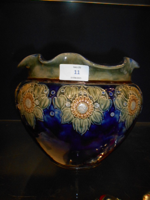 A Royal Doulton blue and green glazed jardiniere with fluted rims and floral decoration