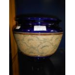 A Doulton Slater cobalt blue ground jardiniere with incised flowers and leaf decoration