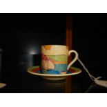 A Clarice Cliff Fantasque Bizarre coffee can and saucer having sailing boat scene  Saucer good