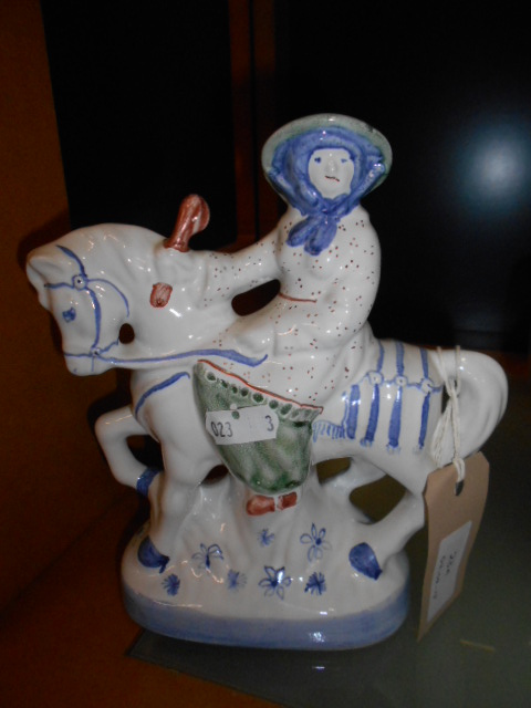 A hand-painted Rye Pottery figure 'The Wife Of Bath' from The Canterbury Tales collection,