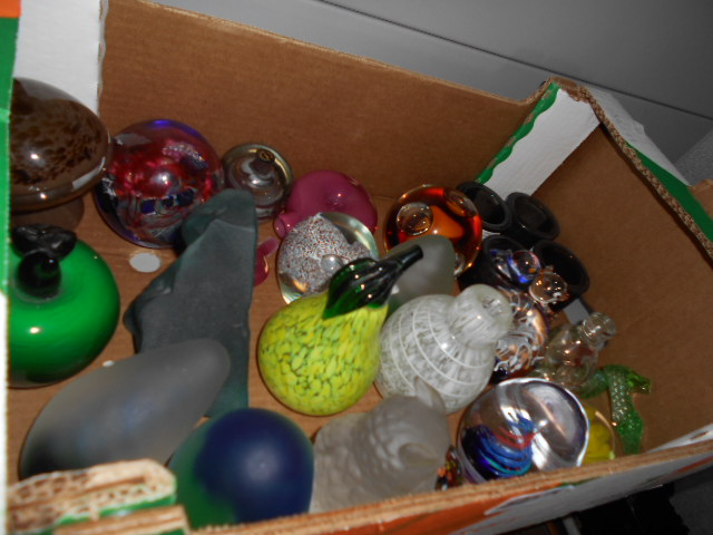 A selection of paperweights etc to include Mdina, Wedgwood examples, a Langham glass scent bottle,