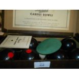 A boxed set of B & A 'Banda' carpet bowls