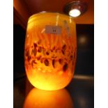A Jeff Wilke multi coloured art glass vase of cylindrical tapering form,