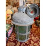 A late 19th C Arts & Crafts dome top hall lantern embossed with spirals and bands of flowers and