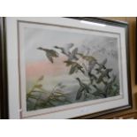A large 20th C coloured engraving of ducks in flight, signed in the plate to the lower left,