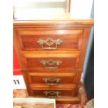 A 20th c mahogany table top chest of four panelled drawers each fitted with brass swing handles and