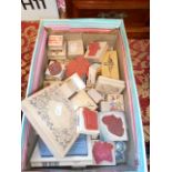 A box of wooden and rubber craft stamps to include dragons, fish,