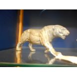 A 20th C carved marble panther signed F.