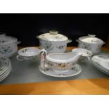 A Royal Doulton 'Provencal' pattern part dinner service, to include tureens, sauce boat,