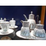 A Prouna fine bone china tea-set comprising of teapot, sugar and cream jug,