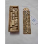 An early 19th C carved bone domino set in box,