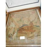 A mid-19thC sampler depicting a figure and deer in landscape with religious inscription above,
