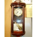 A mahogany cased 'Highlands' wall clock,