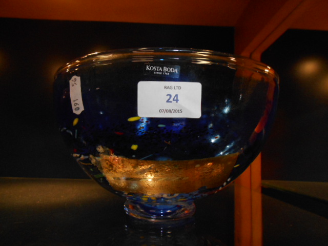 A Kosta Boda blue and white multi coloured are glass bowl engraved signature to base