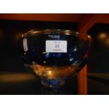 A Kosta Boda blue and white multi coloured are glass bowl engraved signature to base