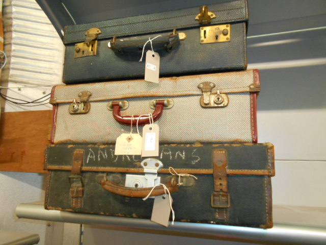 An early 20th C blue leather fitted vanity case,