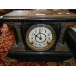A 19th C Seth Thomas Clock Company faux marble and slate mantle clock,