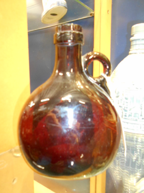 A 19th C brown glass wine bottle