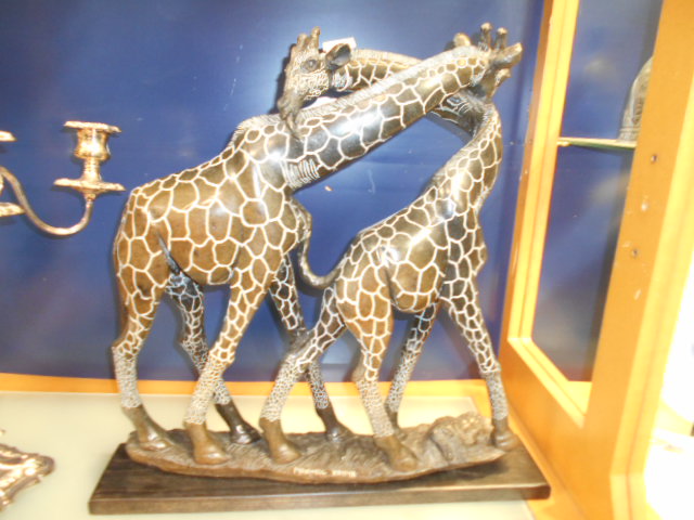 MAXWELL KAYIYA, Zimbabwe , Springstone Shona sculpture of two entwined giraffes grooming,