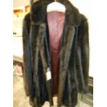 An imitation black fur coat