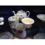 A Wilkinson hand-painted tea-set to include tea pot, milk jug, sugar bowl,