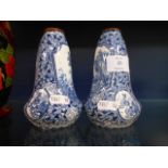 A pair of Royal Bonn Germany blue and white vases with pictorial panels