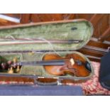 An early 20th C violin with double veneered back, no makers label and two bows,