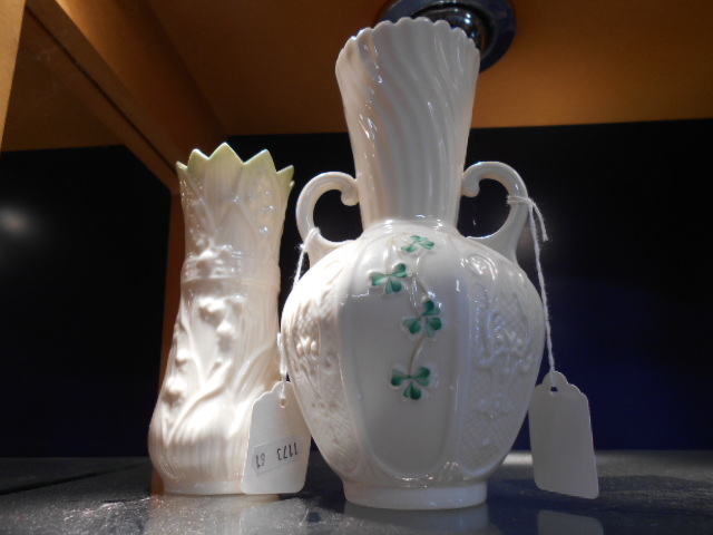 Two Belleek vases one having two handles and gold back-stamp and the other with green back-stamp