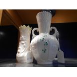 Two Belleek vases one having two handles and gold back-stamp and the other with green back-stamp