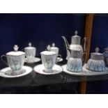 A Prouna fine bone china tea-set comprising of teapot, sugar and cream jug,