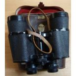 Pair of Dollond 10x50 binoculars in leat