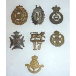 7 Shako badges inc Suffolk Regiment, Ess