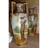 Pair of hand painted urn shaped vases wi