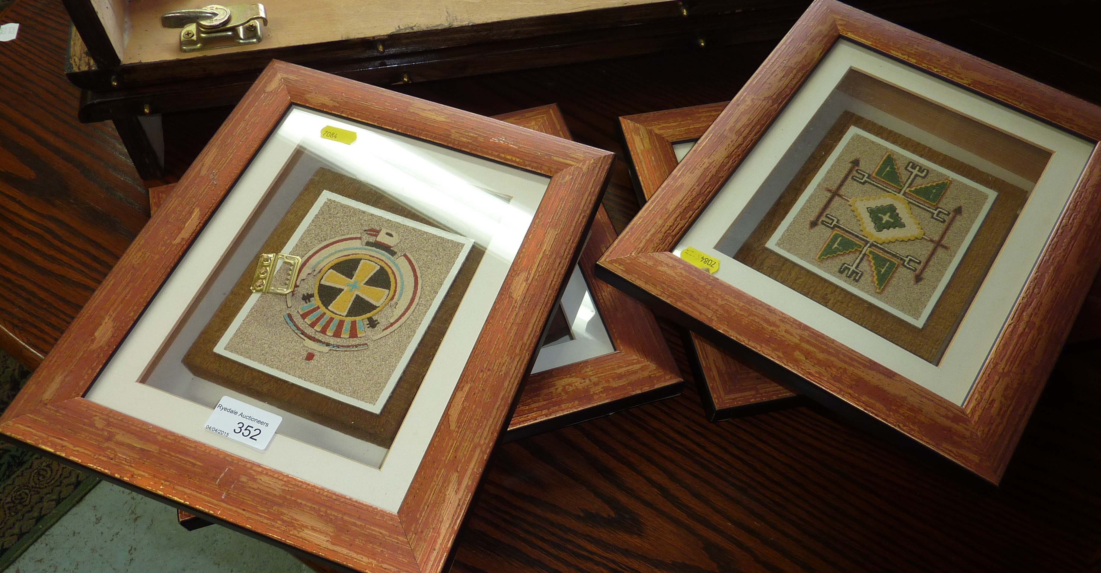 Set of 4 framed Native American style sand pictures