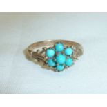 Boxed 9ct gold and turquoise flower head ring