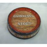 Minton's Guinness Stout advertising coaster/ash tray in the form of a barrel end, the underneath