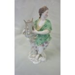 Meissen style figure of a classical semi clad lady playing the harp with blue cross sword marked to