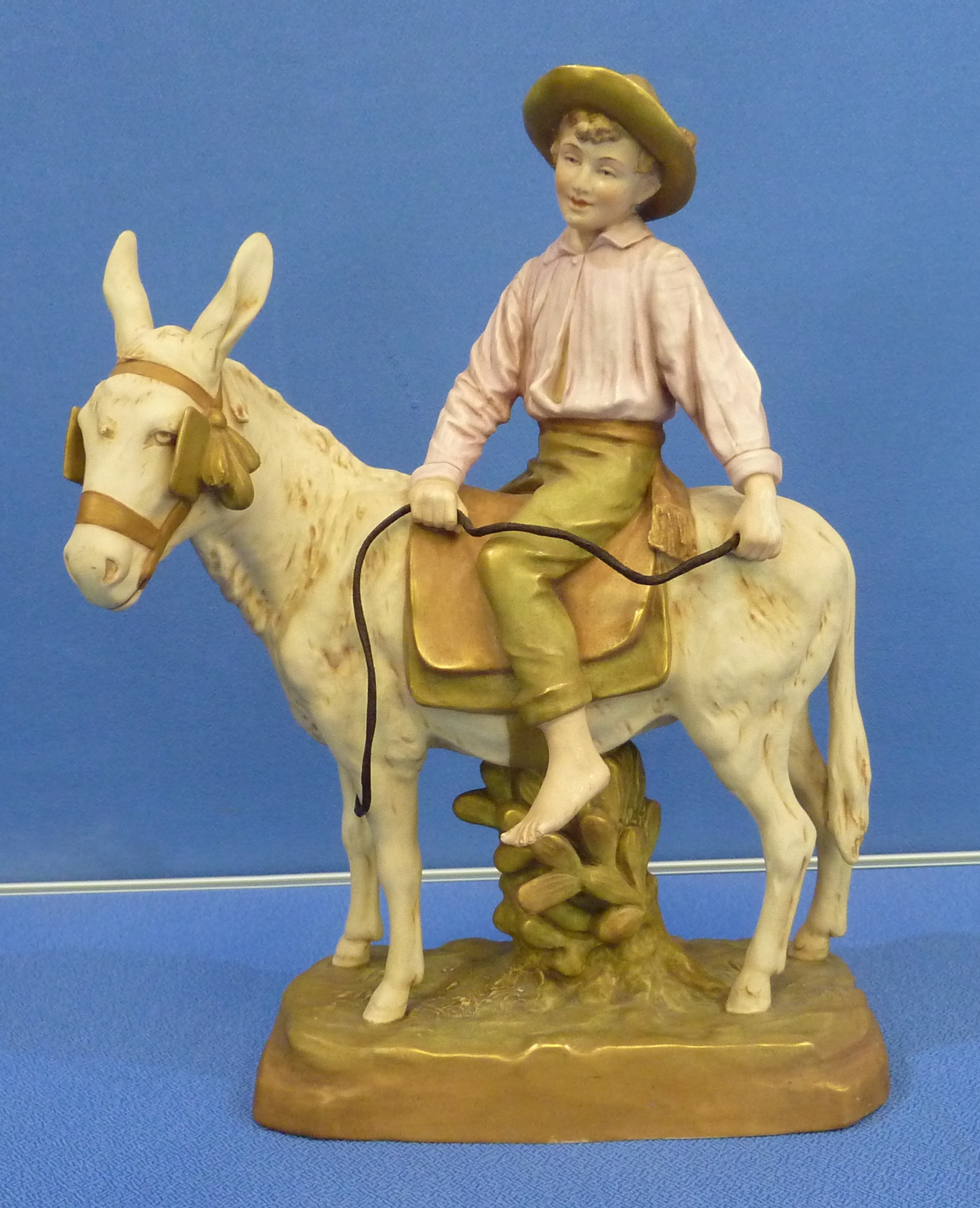 Large Royal Dux figural group of a boy on the back of a donkey height 38cm (No19894)