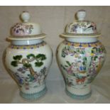 Pair of Oriental vases depicting various scenes including warriors on horseback with six digit