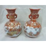 Pair of Japanese satsuma style vases with twin handles and signature panel to the base (height