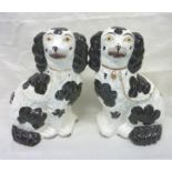 Pair of Staffordshire black and white se