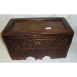 Unusual carved oak box with panelled top