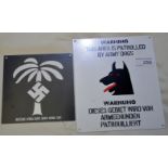 Reproduction metal German dog patrol sign and an African corp sign (2)