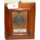 Framed cased displayed Mr Boulton's medal for Trafalgar,