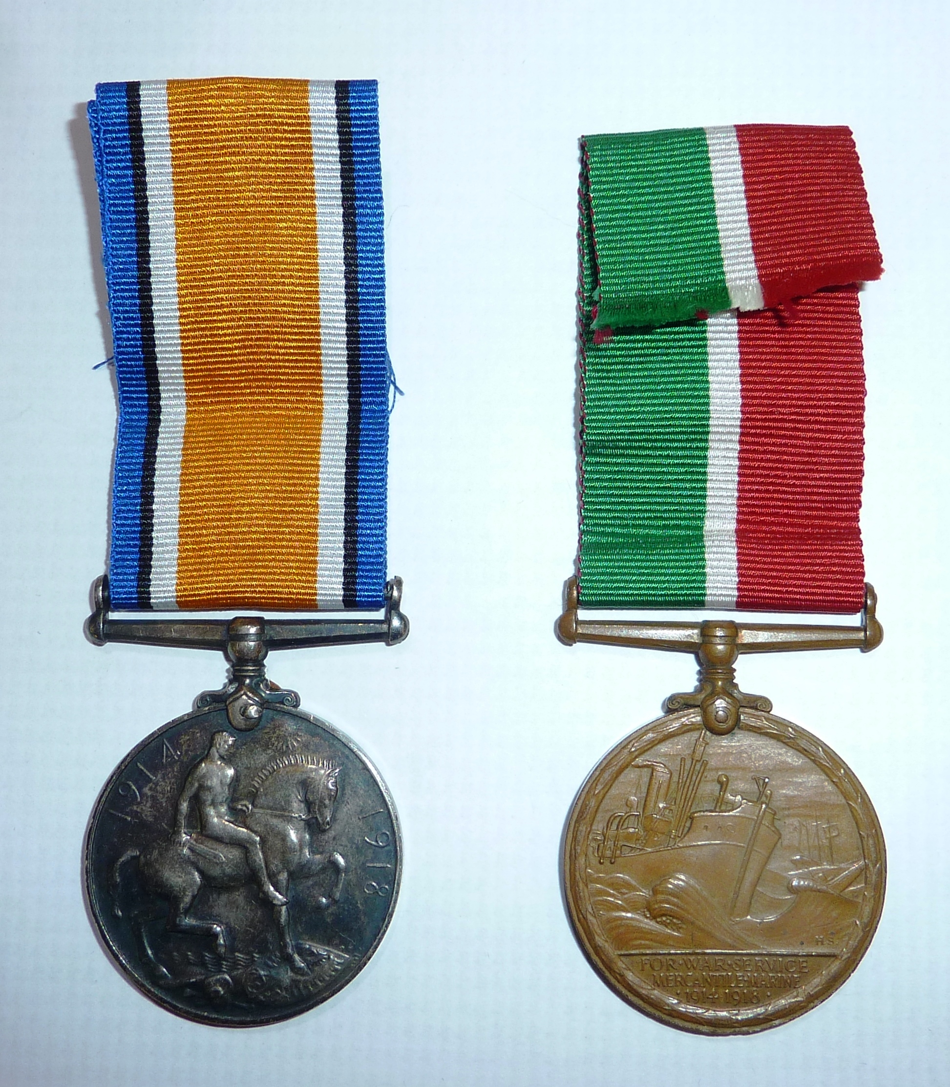 WWI military and marine merchantile pair with British war medal awarded to 'Luke Cook'