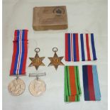 WWII group boxed as issued comprising of