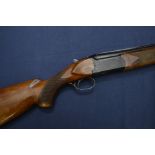 12 bore over and under Franchi 1/4 + 1/2 chokes, 2 and 3/4 inch chambers,