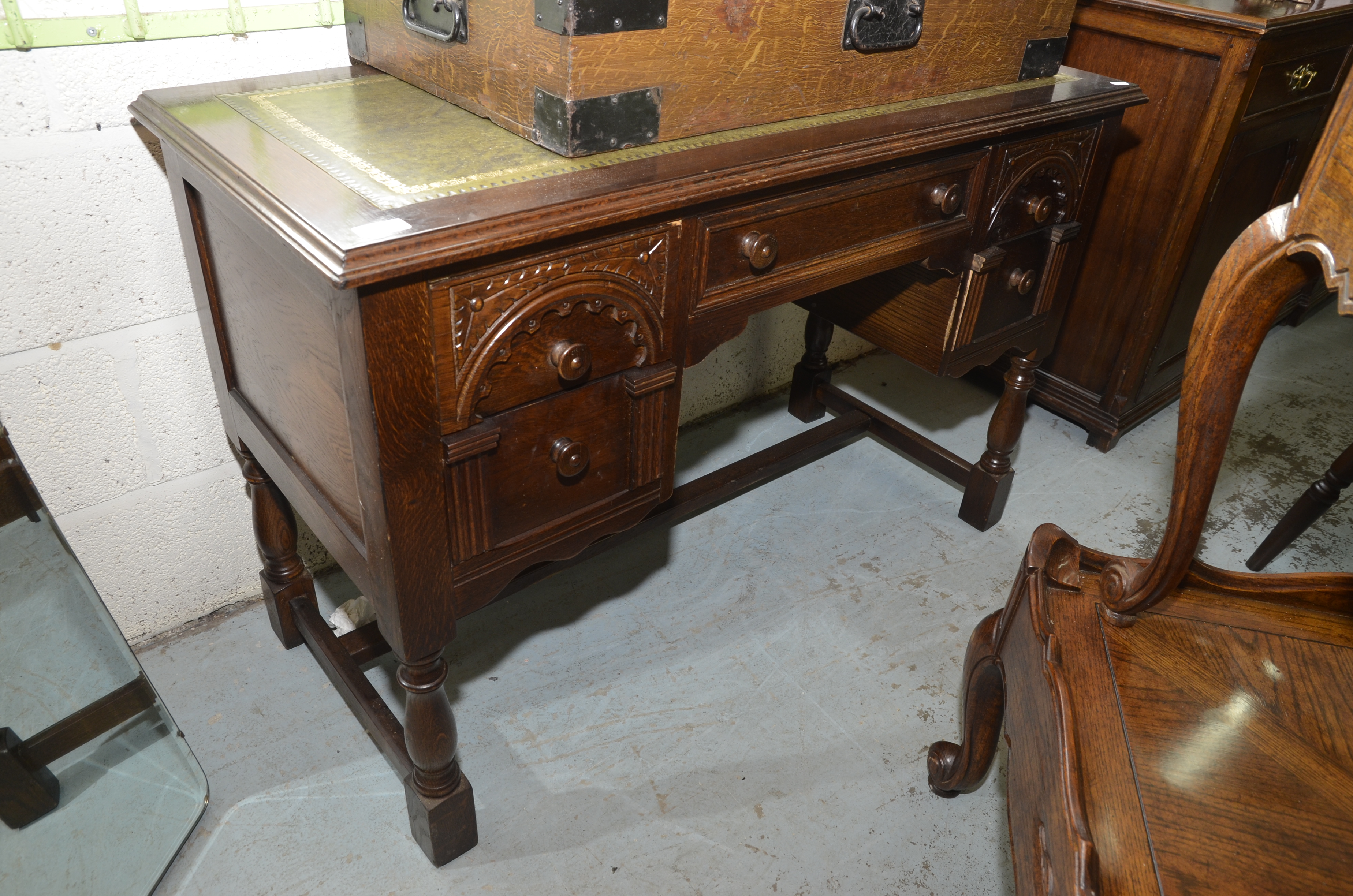 Oak knee hole desk with leather inset top